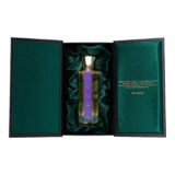Bellekin INNA Parfum luxe zwarte doos welke open staat met de fles parfum met paarse gouden opdruk en verpakking groen satijn.